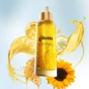 Hair Repair Serum bottle surrounded by golden oil, honeycomb and a sunflower