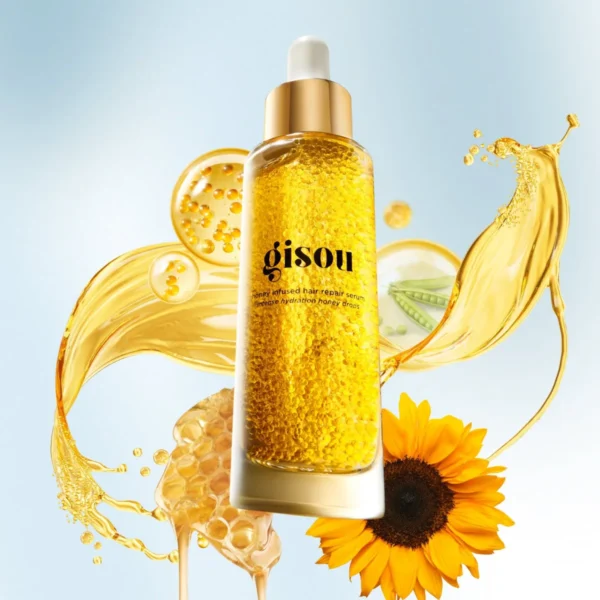 Hair Repair Serum bottle surrounded by golden oil, honeycomb and a sunflower